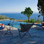 Natura,infinity Pool Overlooking The Aegean Stafylos